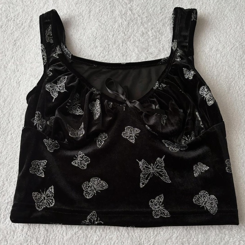 black and silver butterfly top